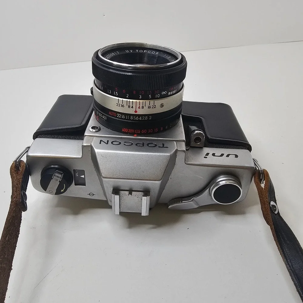 Vintage Topcon Uni 35mm SLR Camera with UV Topcor 53mm f2 Lens and Case Untested